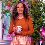 Sunny’s orange metallic knit sweater and skirt on The View