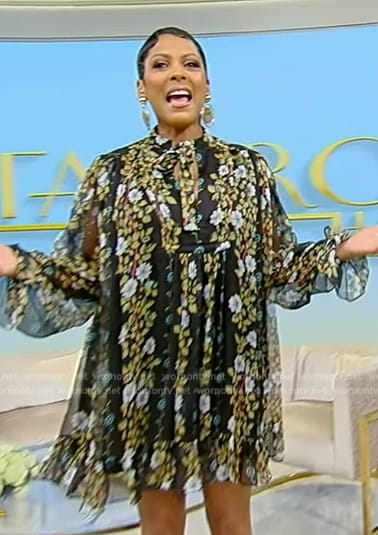 Tamron’s black floral print tie neck dress on Tamron Hall Show
