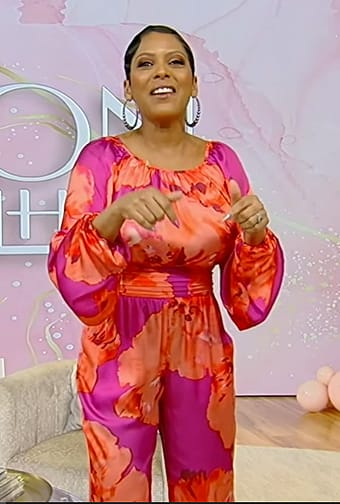 Tamron’s pink and red floral print top and pants on Tamron Hall Show