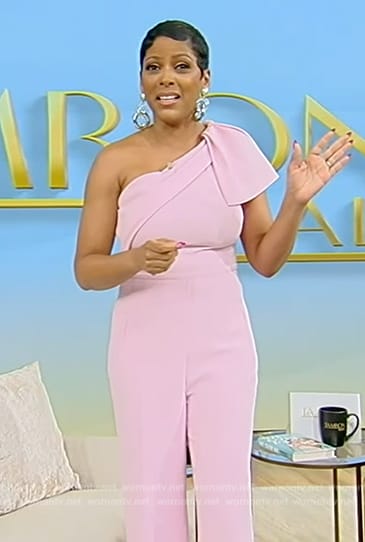 Tamron’s pink one shoulder jumpsuit on Tamron Hall Show