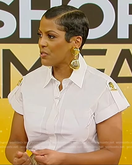 Tamron’s white shirt and baggy skirt on Tamron Hall Show
