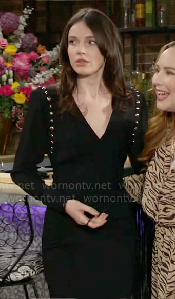 Tessa’s black studded mini dress on The Young and the Restless
