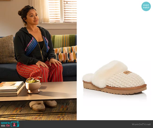 Ugg Cozy Shearling Mule Slippers worn by Nell Serrano (Gina Rodriguez) on Not Dead Yet