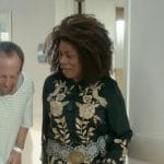 Vi’s black floral embroidered top on The Equalizer