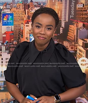 Zinhle’s black collared puff sleeve blouse on NBC News Daily