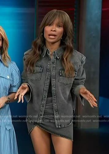 Zuri’s black denim shirt and mini skirt on Access Hollywood