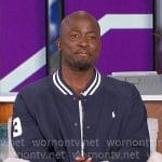 Akbar’s navy bomber jacket on The Talk