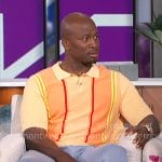 Akbar’s orange vertical stripe polo shirt on The Talk
