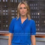 Alex Wilson’s blue tie neck top and pants on CBS Evening News