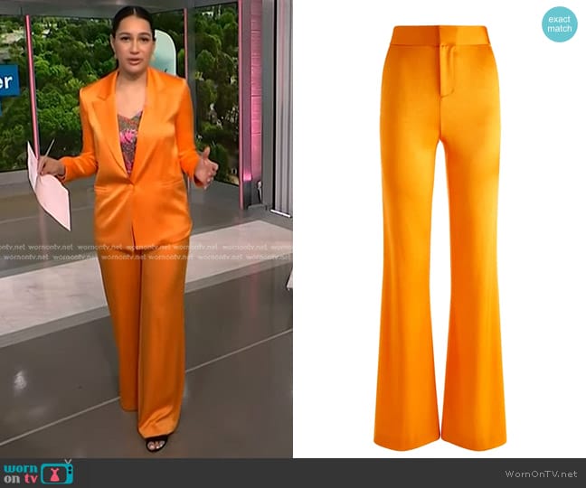 Alice + Olivia Deanna High Waist Pant in Tangerine worn by Morgan Radford on NBC News Daily