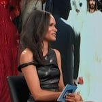 Amanda Garrigus’s black off shoulder leather mini dress on E! News