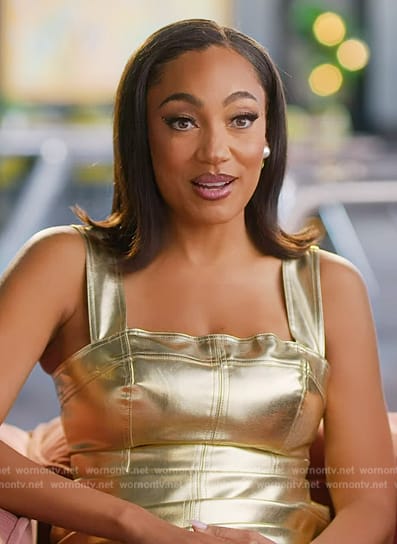 Brandi’s gold confessional dress on Selling the OC