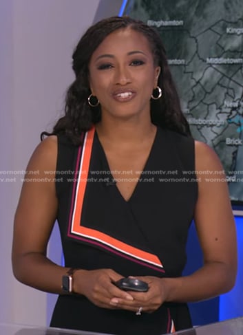 Brittany Bell’s black stripe-trim wrap dress on Good Morning America
