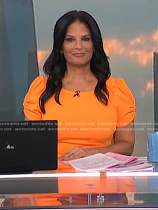 Darlene’s orange puff sleeve dress on Today