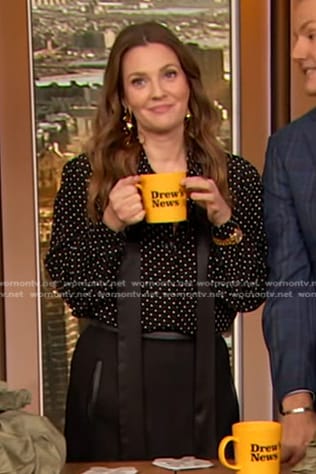 Drew’s black polka dot tie neck blouse on The Drew Barrymore Show