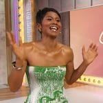 Emayatzy Corinealdi’s green scalloped top and skirt on Sherri
