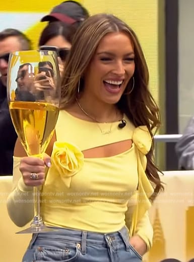 Emily Orozco’s yellow floral applique top on Access Hollywood