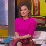 Eva’s pink short sleeve sweater and floral lace trim skirt on Good Morning America