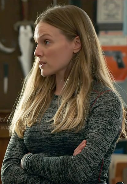 Hailey’s marled sweater top with red stitching on Chicago PD