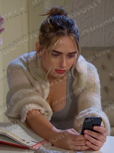 Holly’s striped shrug sweater on Days of our Lives