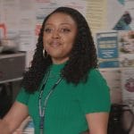 Janine’s green pleated mock neck dress on Abbott Elementary