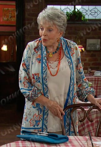 Julie’s white floral duster jacket on Days of our Lives