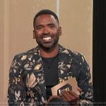 Justin’s black floral print blazer on E! News