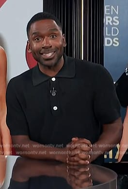 Justin’s black knit polo sweater on E! News