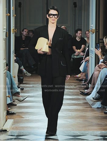 Kendall’s black blazer and pants on The Kardashians