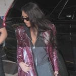 Kim’s red snake effect leather coat on The Kardashians