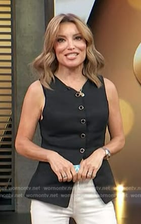 Kit’s black vest on Access Hollywood