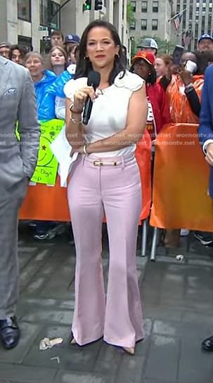 Laura’s white rosette top and pink flare pants on Today