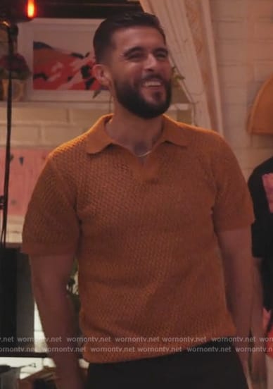Many’s orange knit polo on Abbott Elementary
