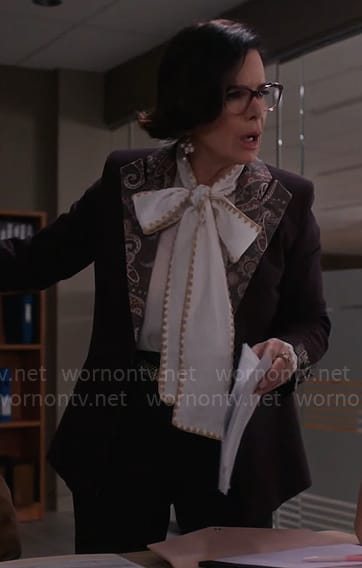 Margaret’s white bow neck blouse on So Help Me Todd