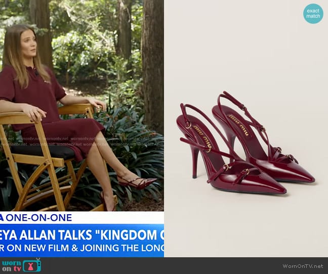 Miu Miu Patent Leather Slingbacks with Buckles in Crimson worn by Freya Allan on Good Morning America