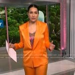 Morgan’s pink paisley print cami and orange suit on NBC News Daily