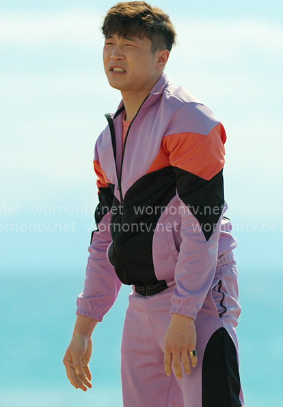 Nicholas’ purple track suit on Loot