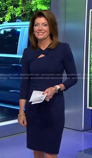 Norah’s navy knotted neck dress on CBS Evening News