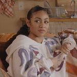 Patience’s white embroidered hoodie on All American