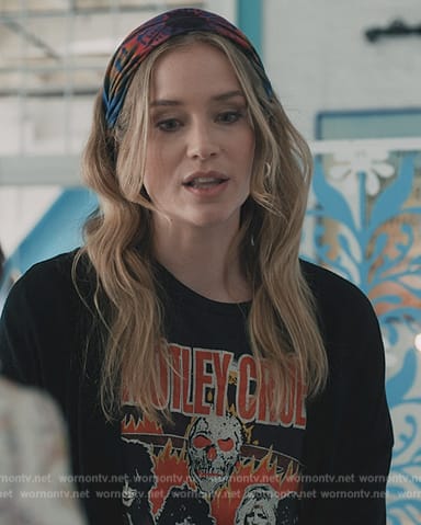 Quinn’s black Motley Crue graphic tee on Elsbeth