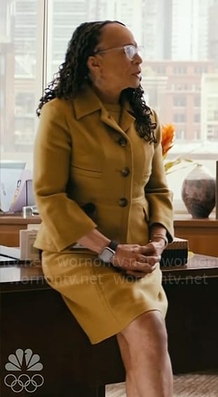 Sharon’s green wool dress and buttoned jacket on Chicago Med