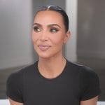 Kim’s black confessional tee on The Kardashians