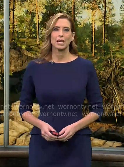 Stephanie Abrams’ navy peplum dress on CBS Mornings
