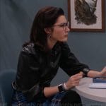 Susan’s leather puff sleeve shirt and blue plaid skirt on So Help Me Todd