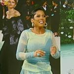 Tamron’s blue mesh printed top and pleated skirt on Tamron Hall Show