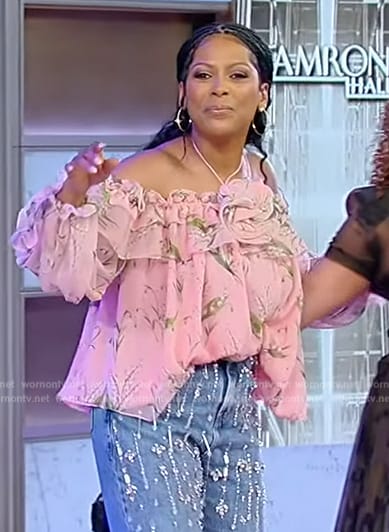 Tamron’s pink floral off shoulder top on Tamron Hall Show