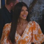 Teresa’s orange floral print dress on The Real Housewives of New Jersey