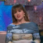 Kelly’s blue abstract print mesh top on The Kelly Clarkson Show