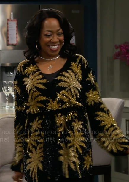 Tina’s black and gold sequin palm tree dress on The Neighborhood