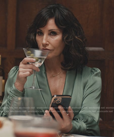Vanessa’s green satin wrap top on Elsbeth